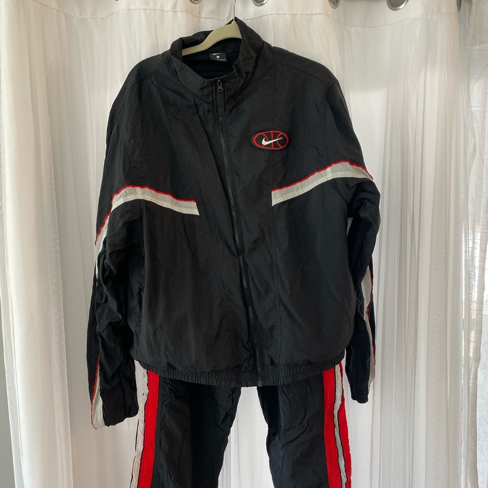 Nike men’s windbreaker tracksuit.  Black and red.  Size large